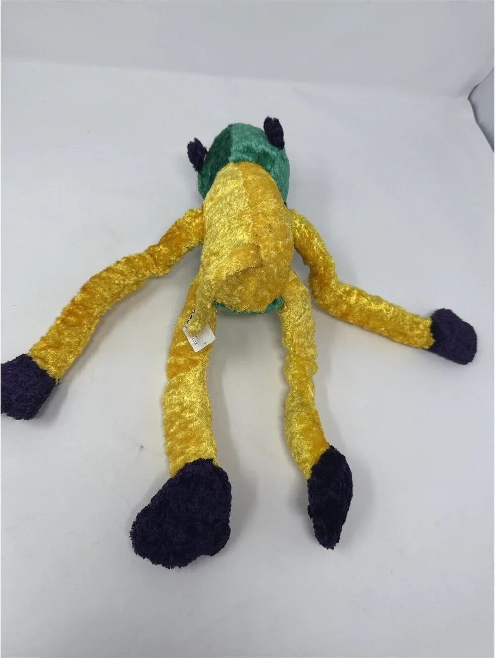 Multi Colored Mardi Gras Monkey Plush